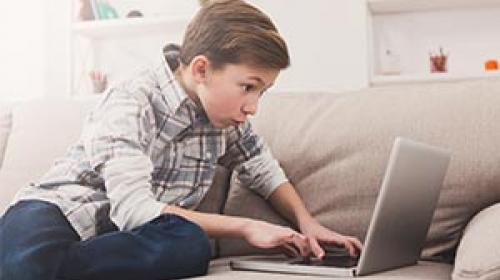 child on laptop using Post-Lockdown Recovery Toolkit