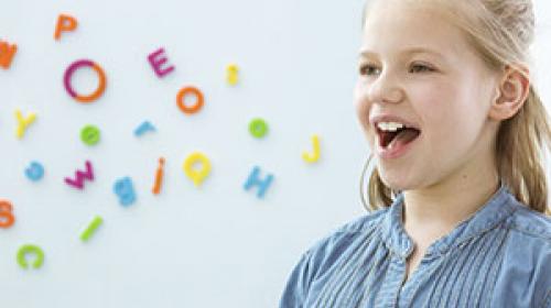Girl with Speech, Language and Communication special needs in therapy